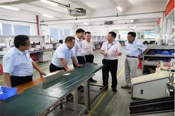 中国磁性材料协会秘书长林安利一行到访惠州福益乐公司（图2）.jpg